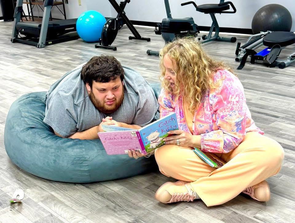 Reading together at the Passionate Care center